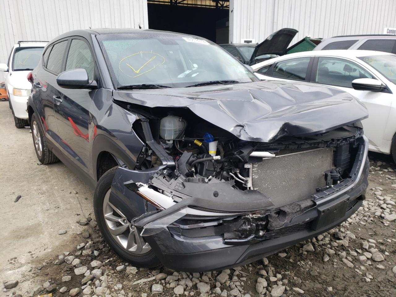HYUNDAI TUCSON SE 2018 with VIN KM8J2CA46JU634985 - Photo from auction