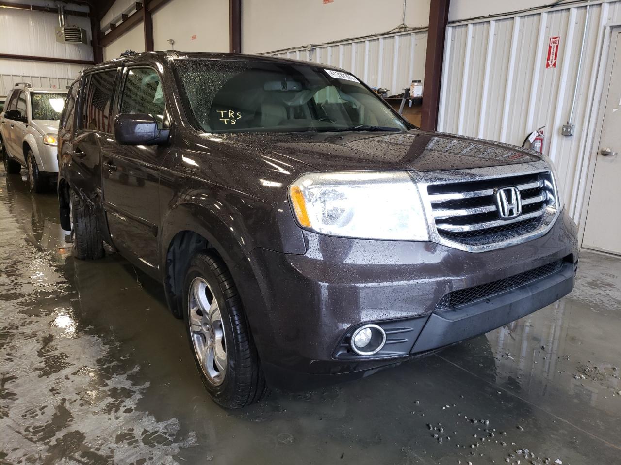 HONDA PILOT EXL 2012 with VIN 5FNYF4H66CB029803 - Photo from auction
