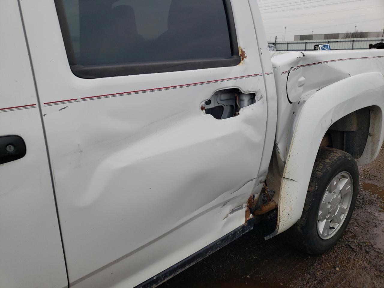 Photo 9 from auction – 2005 CHEVROLET COLORADO with VIN 1GCDS136758119528