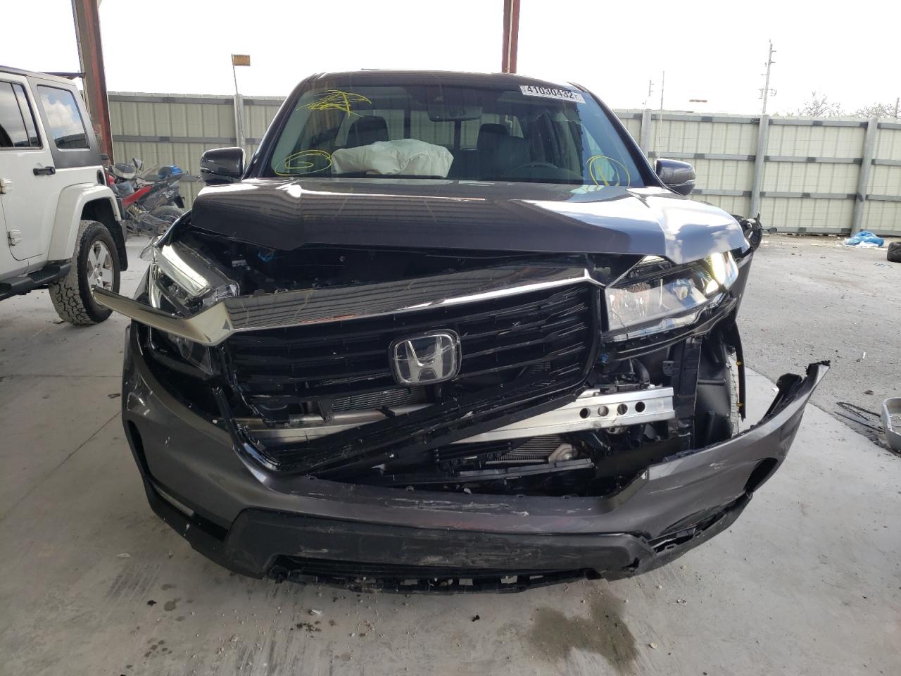 Photo 9 from auction – 2022 HONDA RIDGELINE with VIN 5FPYK3F78NB005627