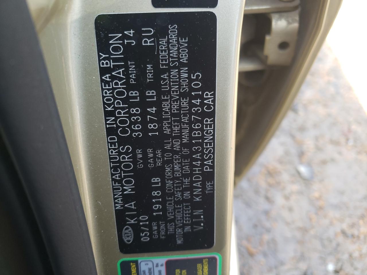 Photo 10 from auction – 2011 KIA RIO BASE with VIN KNADH4A31B6734105