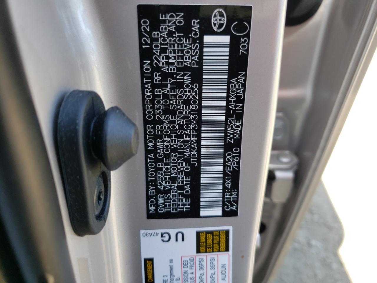 Photo 10 from auction – 2021 TOYOTA PRIUS PRIM with VIN JTDKAMFP3M3180256