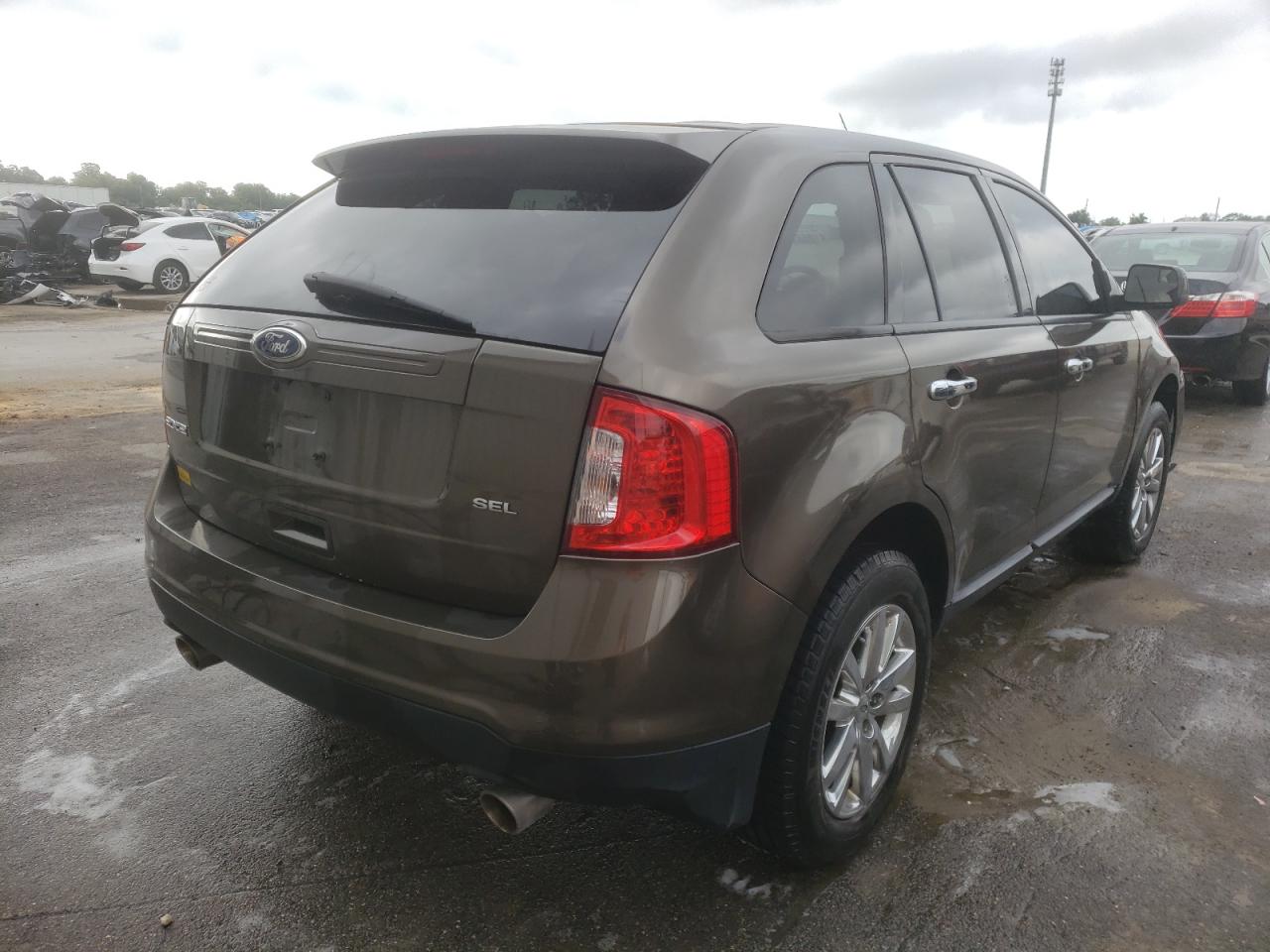 Photo 4 from auction – 2011 FORD EDGE SEL with VIN 2FMDK3JC4BBA79952