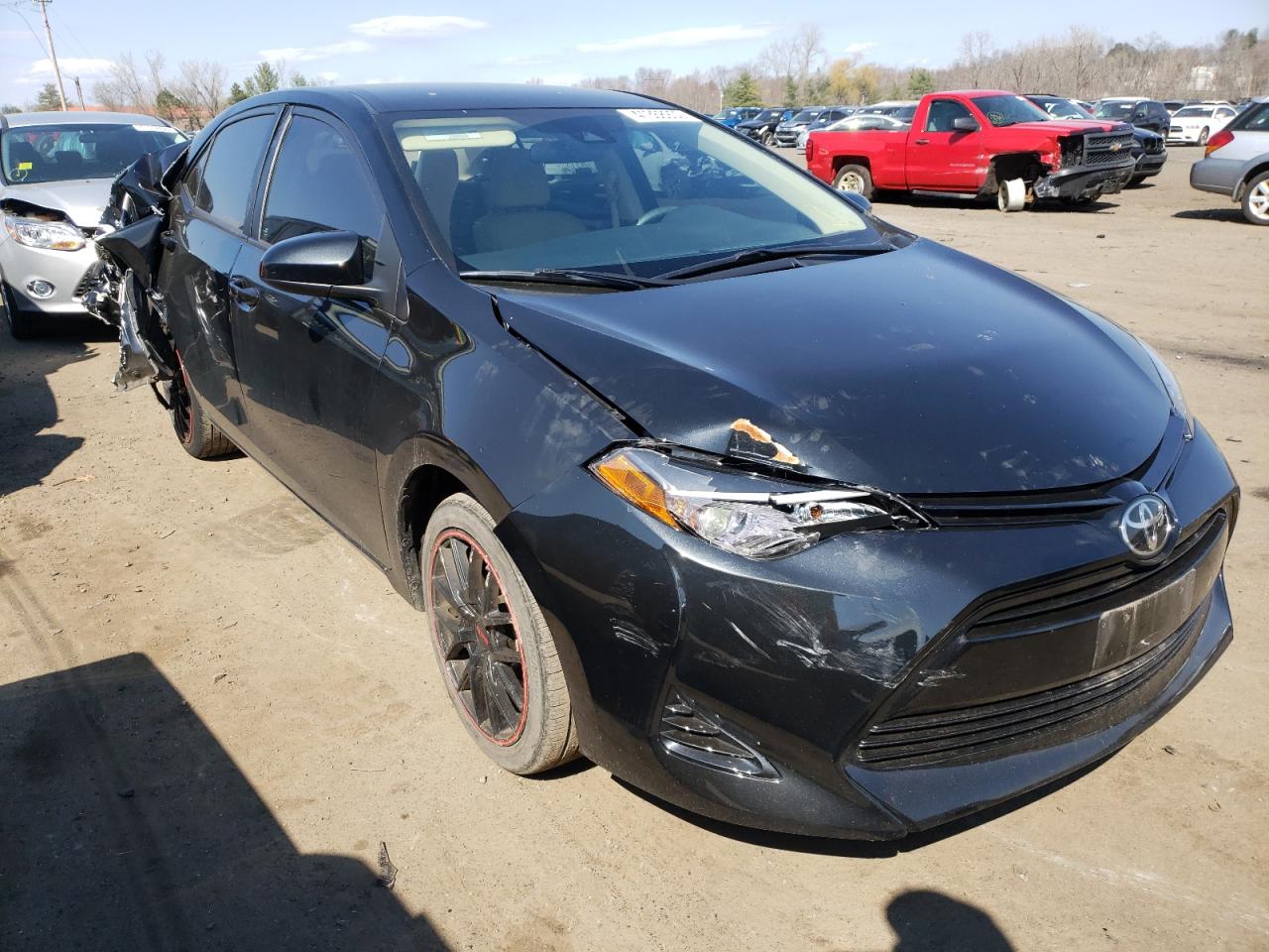 TOYOTA COROLLA L 2017 with VIN 5YFBURHE4HP571350 - Photo from auction