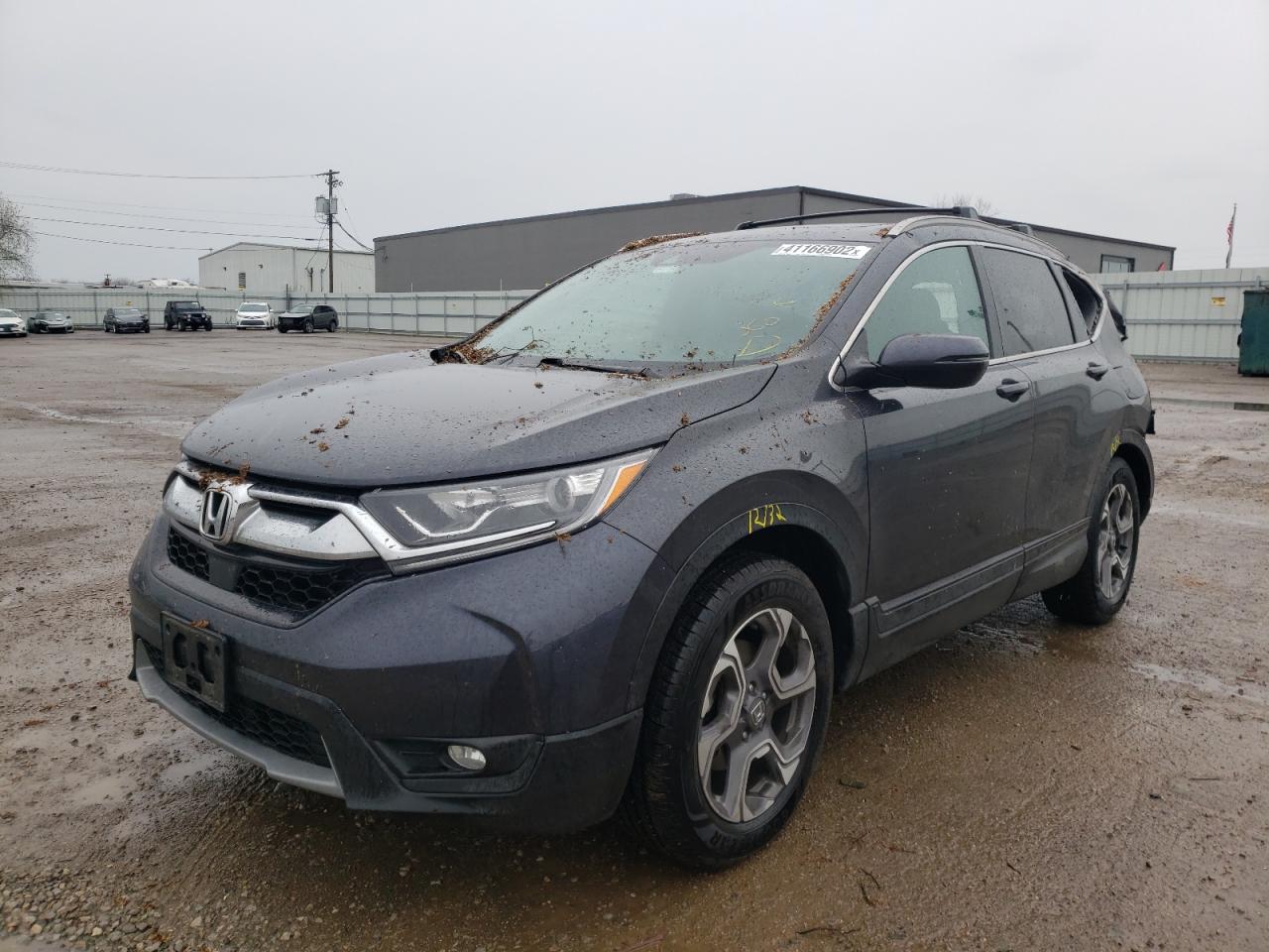 Photo 2 from auction – 2018 HONDA CR-V EX with VIN 7FARW2H51JE034604