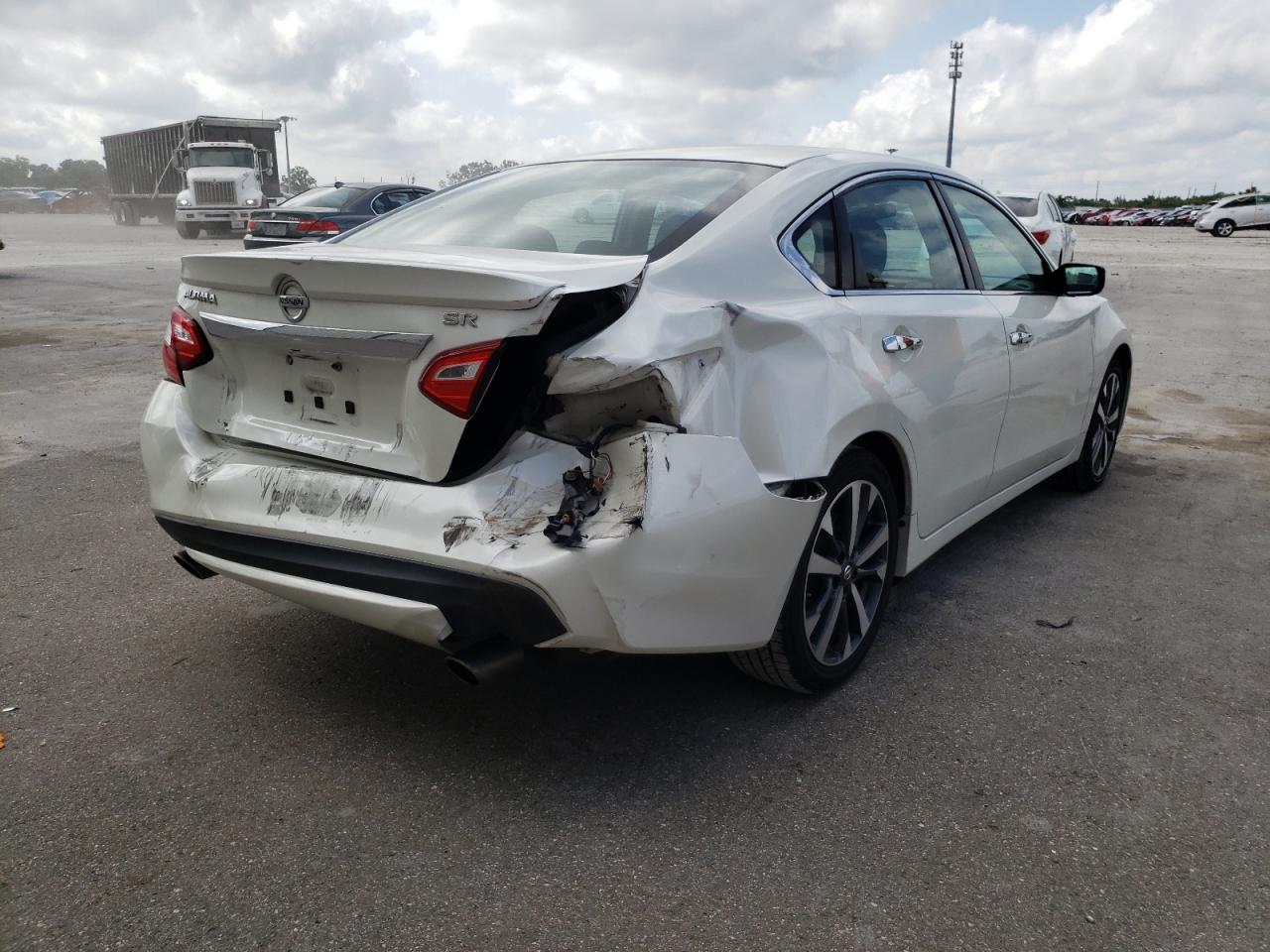 Photo 4 from auction – 2016 NISSAN ALTIMA 2.5 with VIN 1N4AL3AP5GC175013