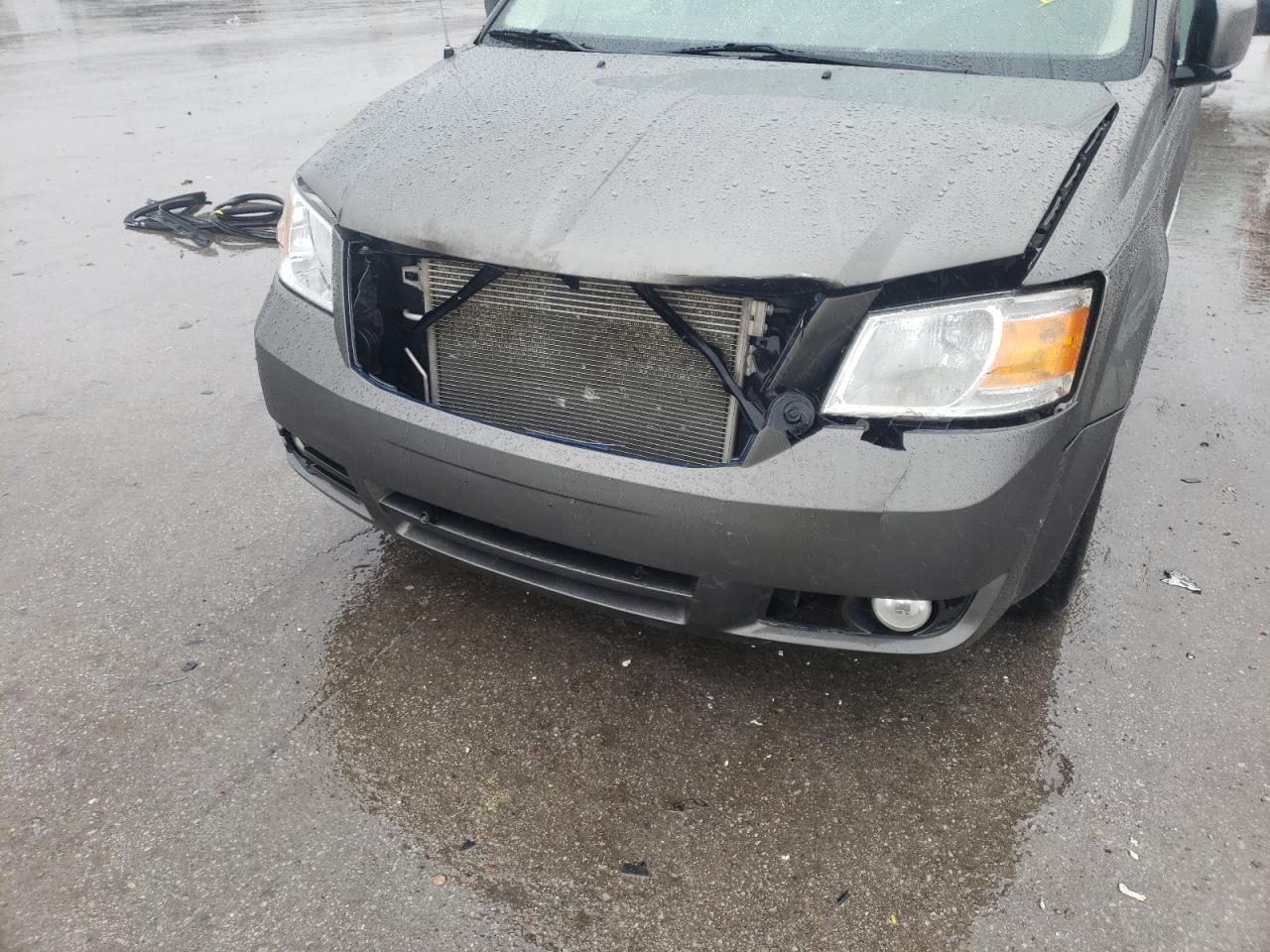 Photo 9 from auction – 2010 DODGE GRAND CARA with VIN 2D4RN5D14AR403126