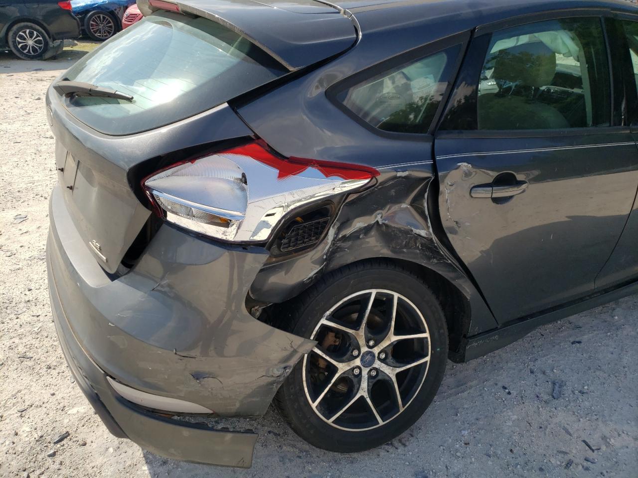 Photo 9 from auction – 2015 FORD FOCUS SE with VIN 1FADP3K20FL215601
