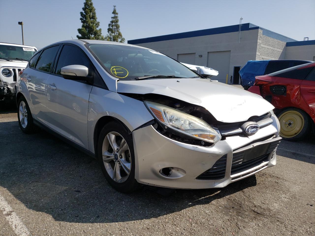 FORD FOCUS SE 2014 with VIN 1FADP3K26EL210319 - Photo from auction