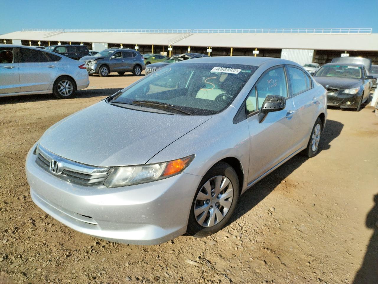 Photo 2 from auction – 2012 HONDA CIVIC LX with VIN 2HGFB2F54CH563248