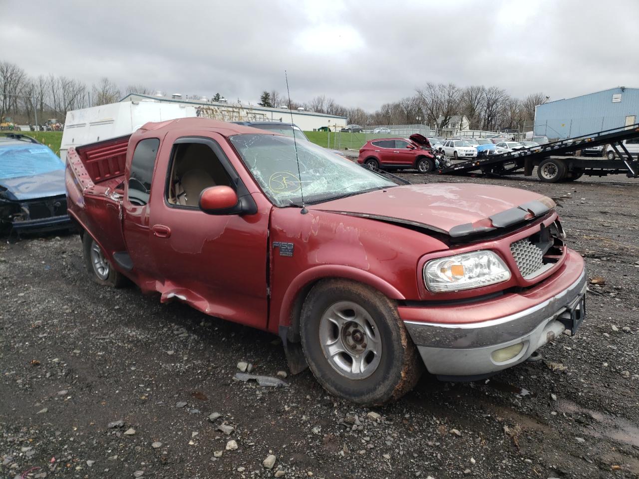 FORD F150 1999 with VIN 1FTRX08L1XKB82159 - Photo from auction