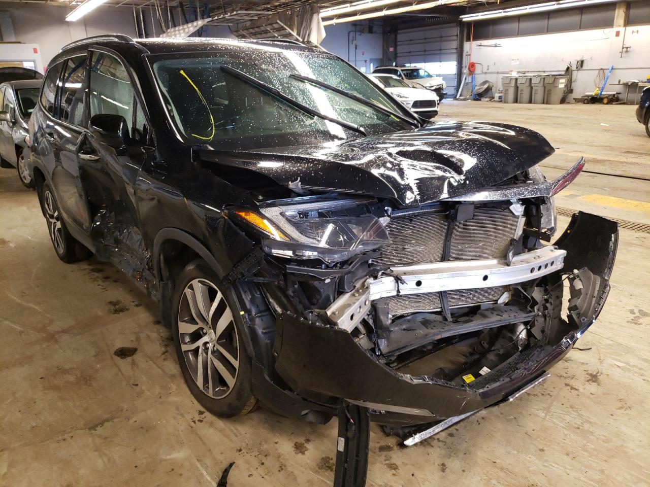 HONDA PILOT ELIT 2017 with VIN 5FNYF6H08HB100272 - Photo from auction