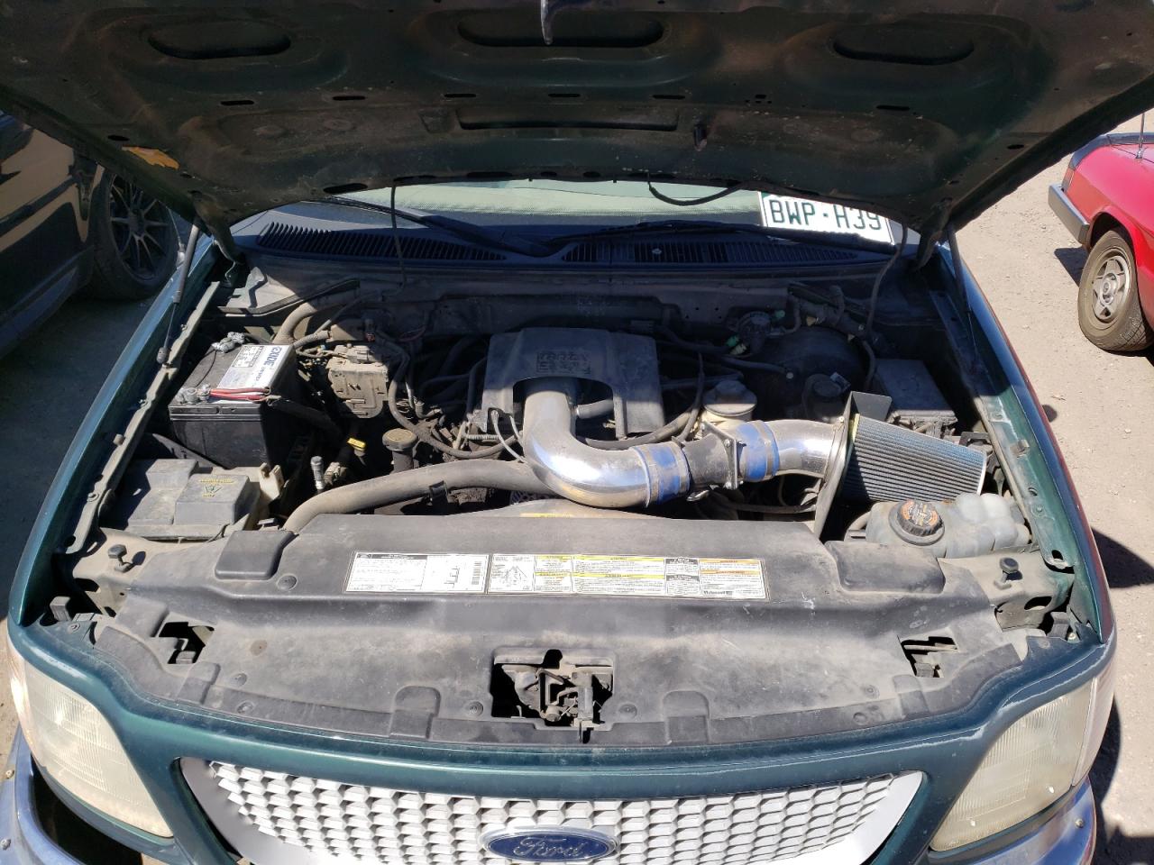 Photo 7 from auction – 1999 FORD F150 with VIN 1FTRX07L1XKB79814