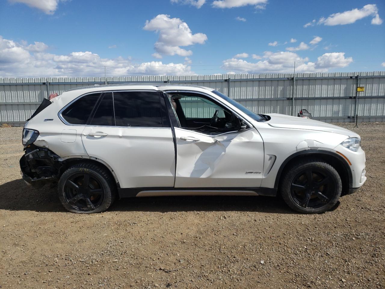 Photo 9 from auction – 2018 BMW X5 XDR40E with VIN 5UXKT0C55J0W02755