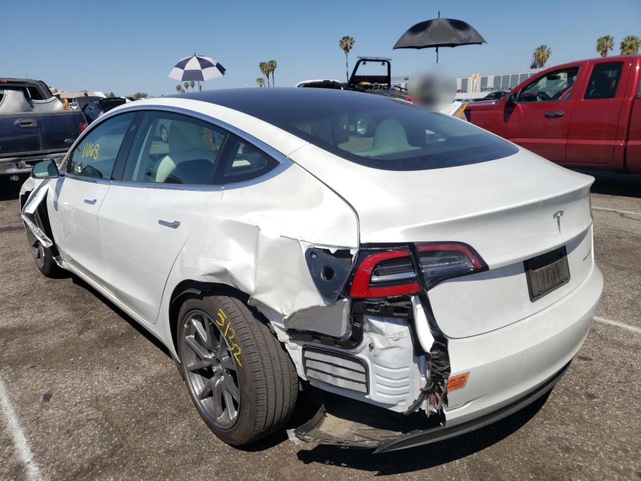 Photo 3 from auction – 2020 TESLA MODEL 3 with VIN 5YJ3E1EBXLF720152
