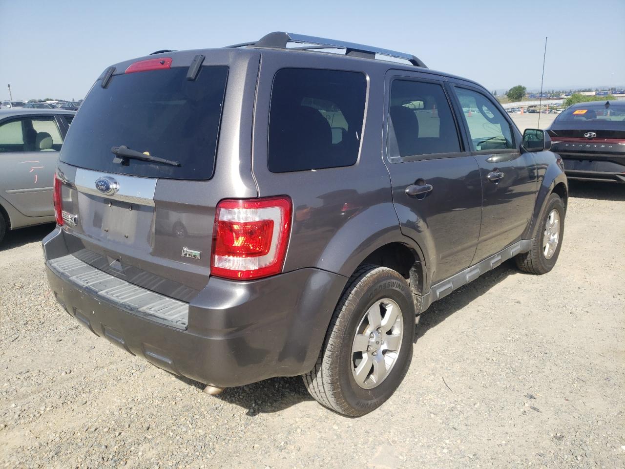 Photo 4 from auction – 2010 FORD ESCAPE LIM with VIN 1FMCU9EG9AKD01511