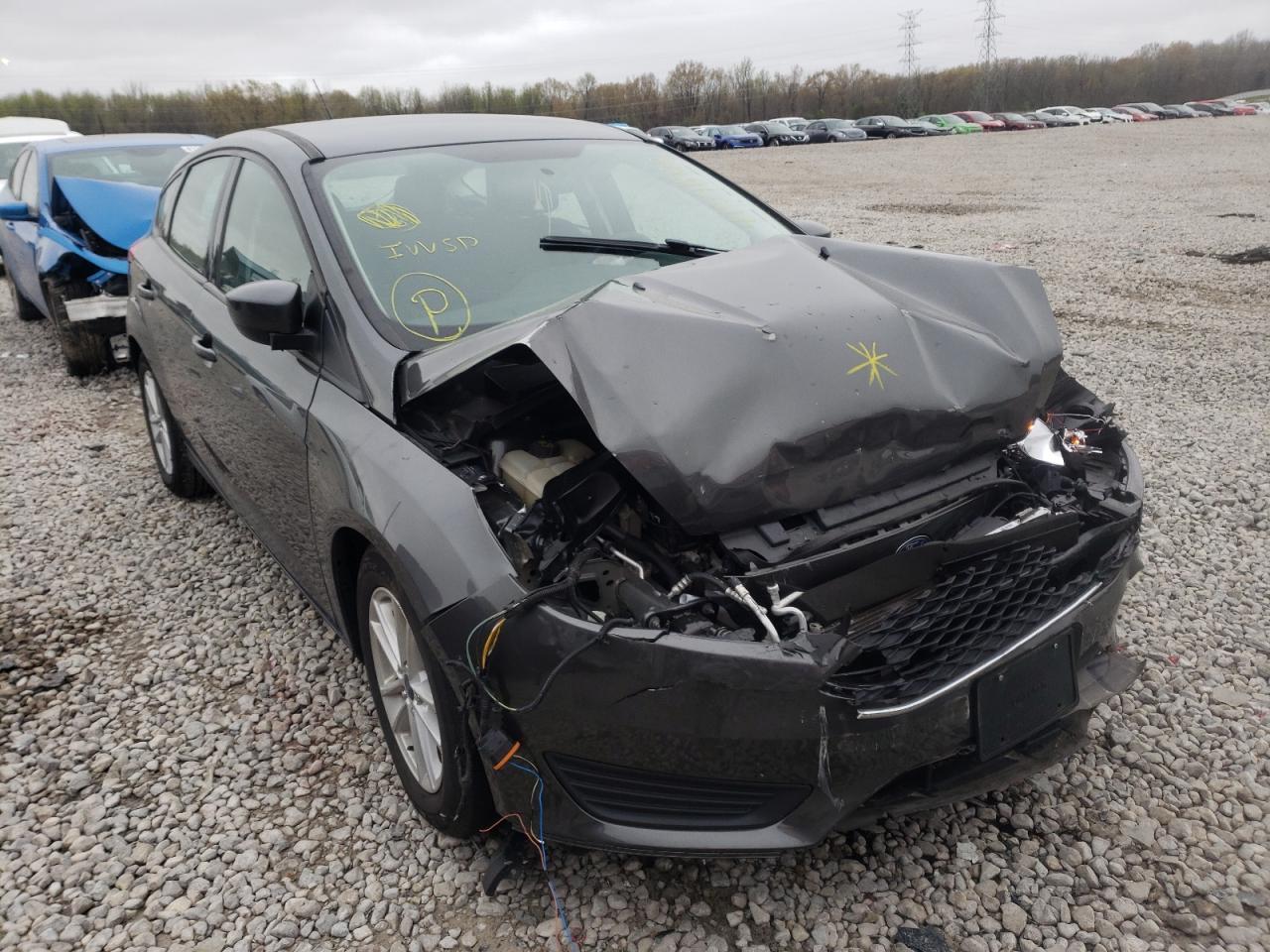 FORD FOCUS SE 2018 with VIN 1FADP3K2XJL212102 - Photo from auction