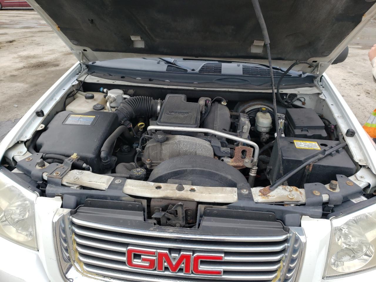 Photo 7 from auction – 2006 GMC ENVOY with VIN 1GKDT13SX62256823