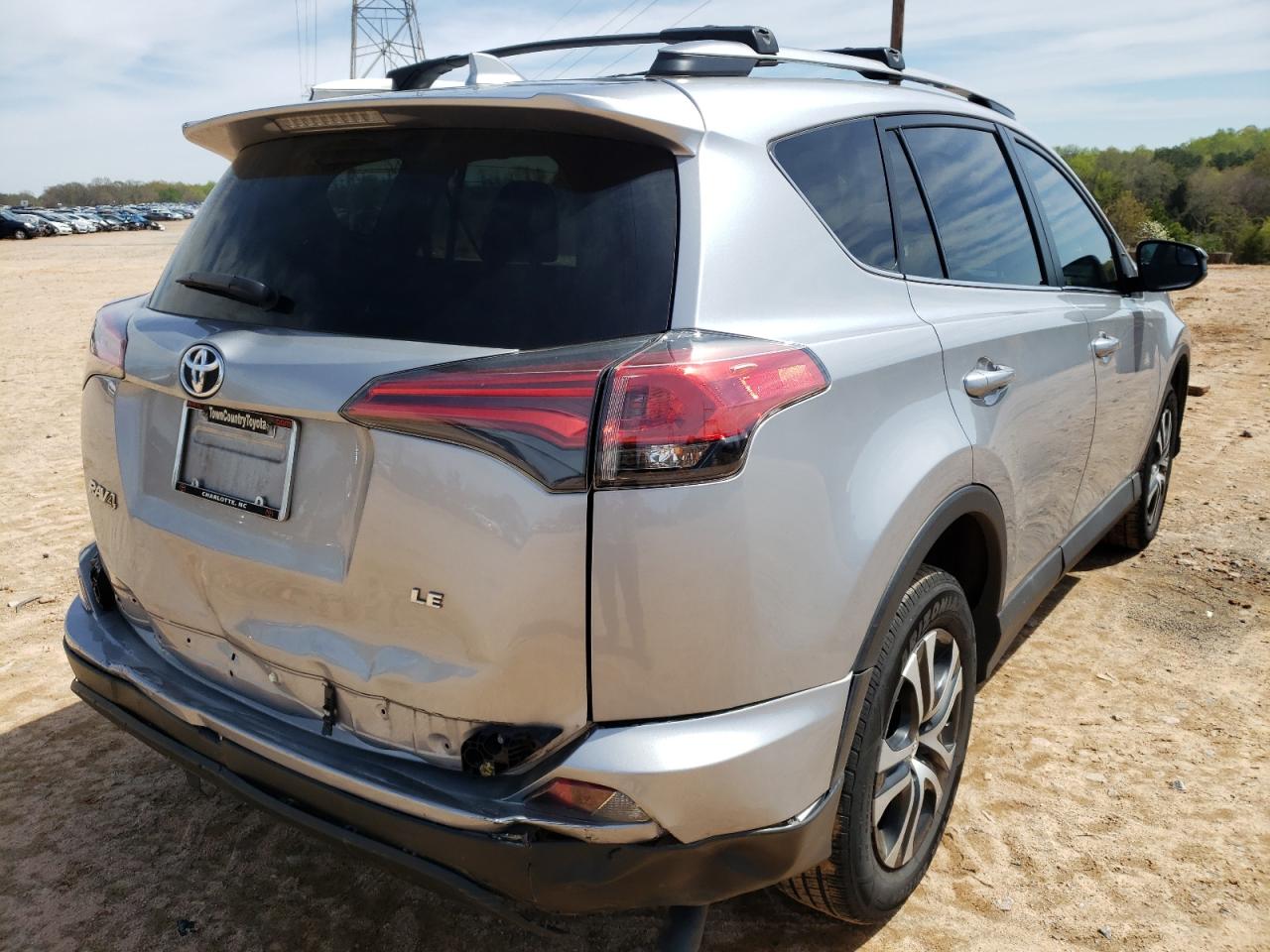 Photo 4 from auction – 2018 TOYOTA RAV4 LE with VIN 2T3ZFREV0JW416710