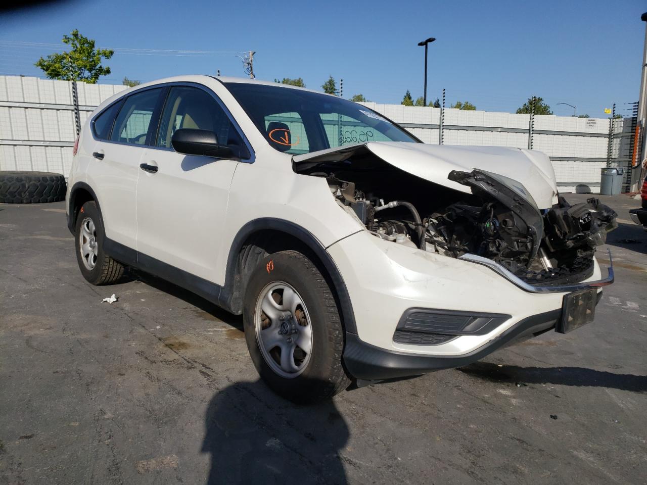 HONDA CR-V LX 2015 with VIN 5J6RM3H39FL010992 - Photo from auction