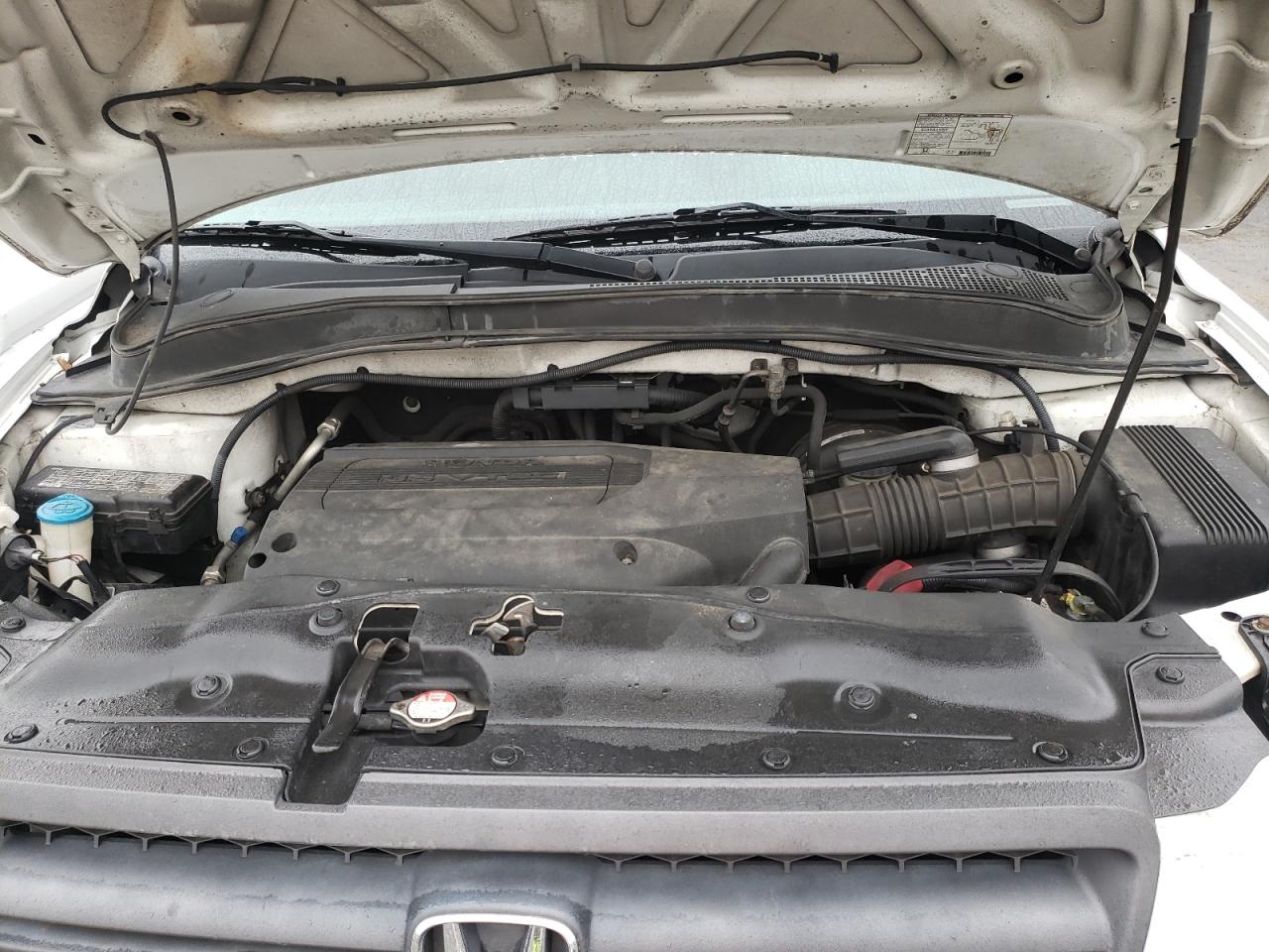 Photo 7 from auction – 2004 HONDA PILOT EXL with VIN 5FNYF18514B002709