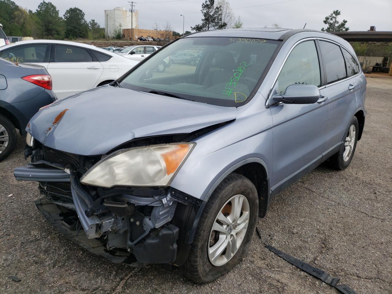 Photo 2 from auction – 2011 HONDA CR-V EXL with VIN JHLRE3H71BC012853