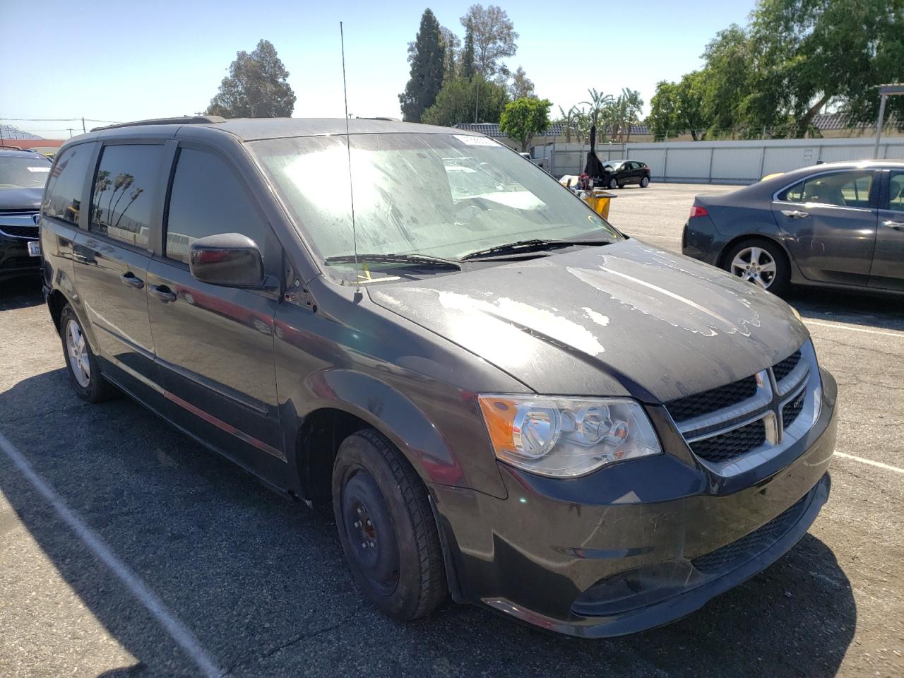 DODGE GRAND CARA 2012 con VIN 2C4RDGCG9CR333207 - Foto de la subasta