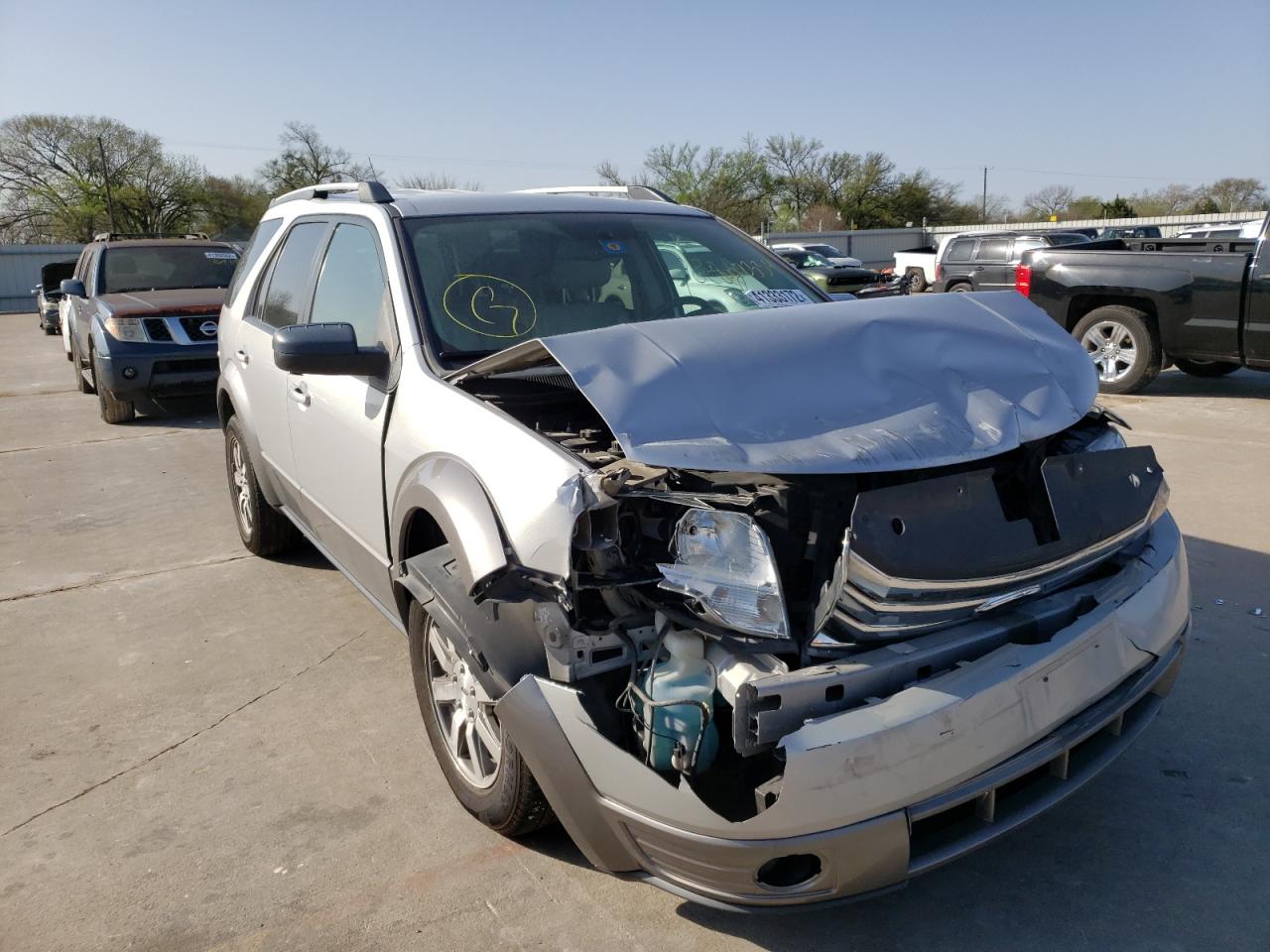 Photo 9 from auction – 2009 FORD TAURUS X S with VIN 1FMDK02W59GA02338