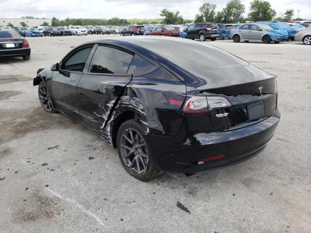 Photo 3 from auction – 2021 TESLA MODEL 3 with VIN 5YJ3E1EB5MF055324