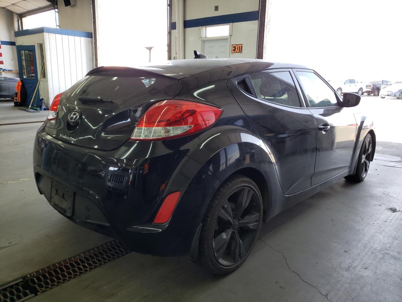 Photo 17 from auction – 2014 HYUNDAI VELOSTER with VIN KMHTC6AD5EU190981