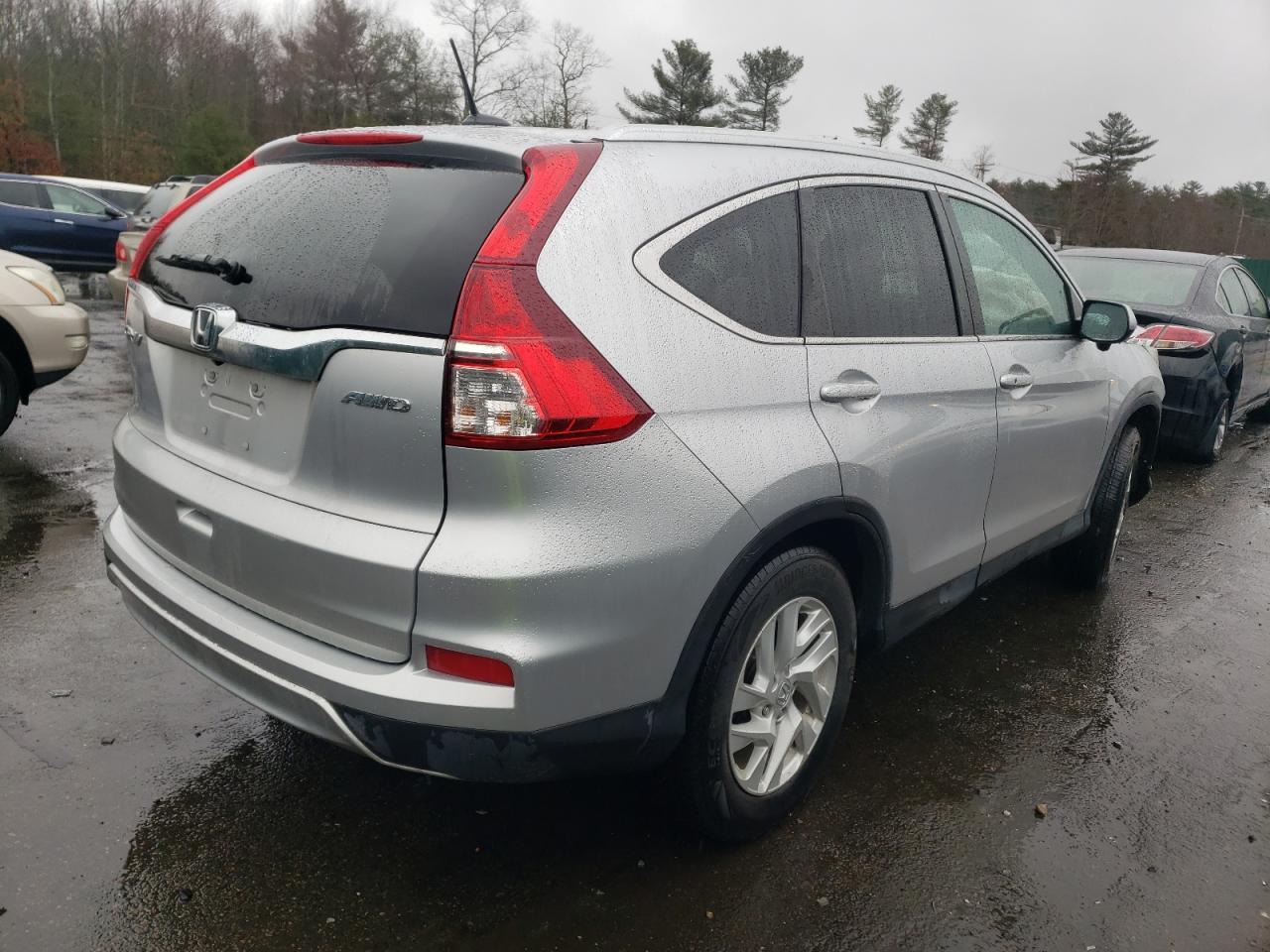 Photo 4 from auction – 2015 HONDA CR-V EXL with VIN 2HKRM4H72FH635009