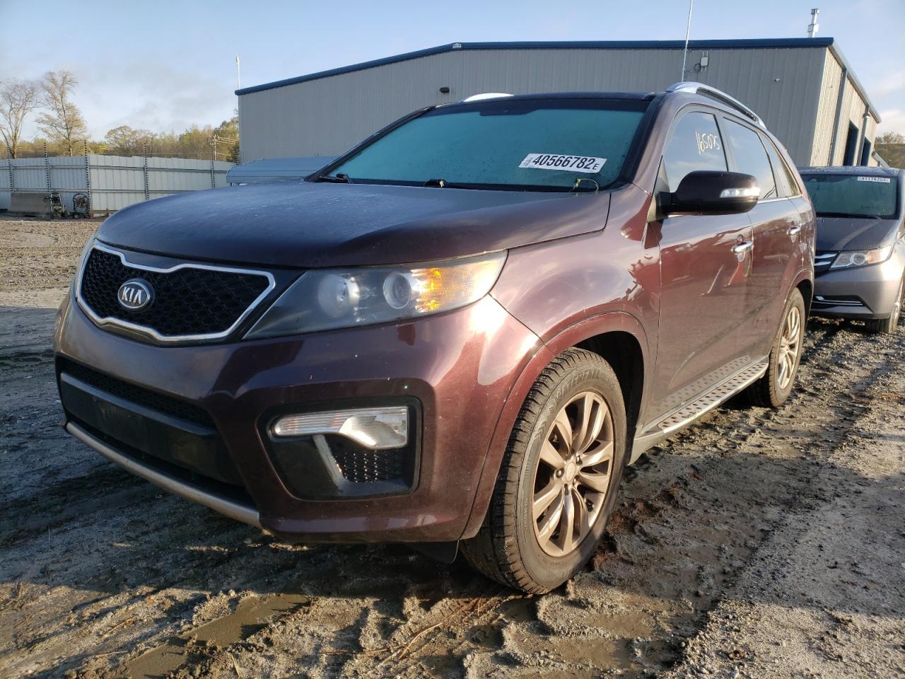 Photo 2 from auction – 2011 KIA SORENTO SX with VIN 5XYKW4A29BG132234