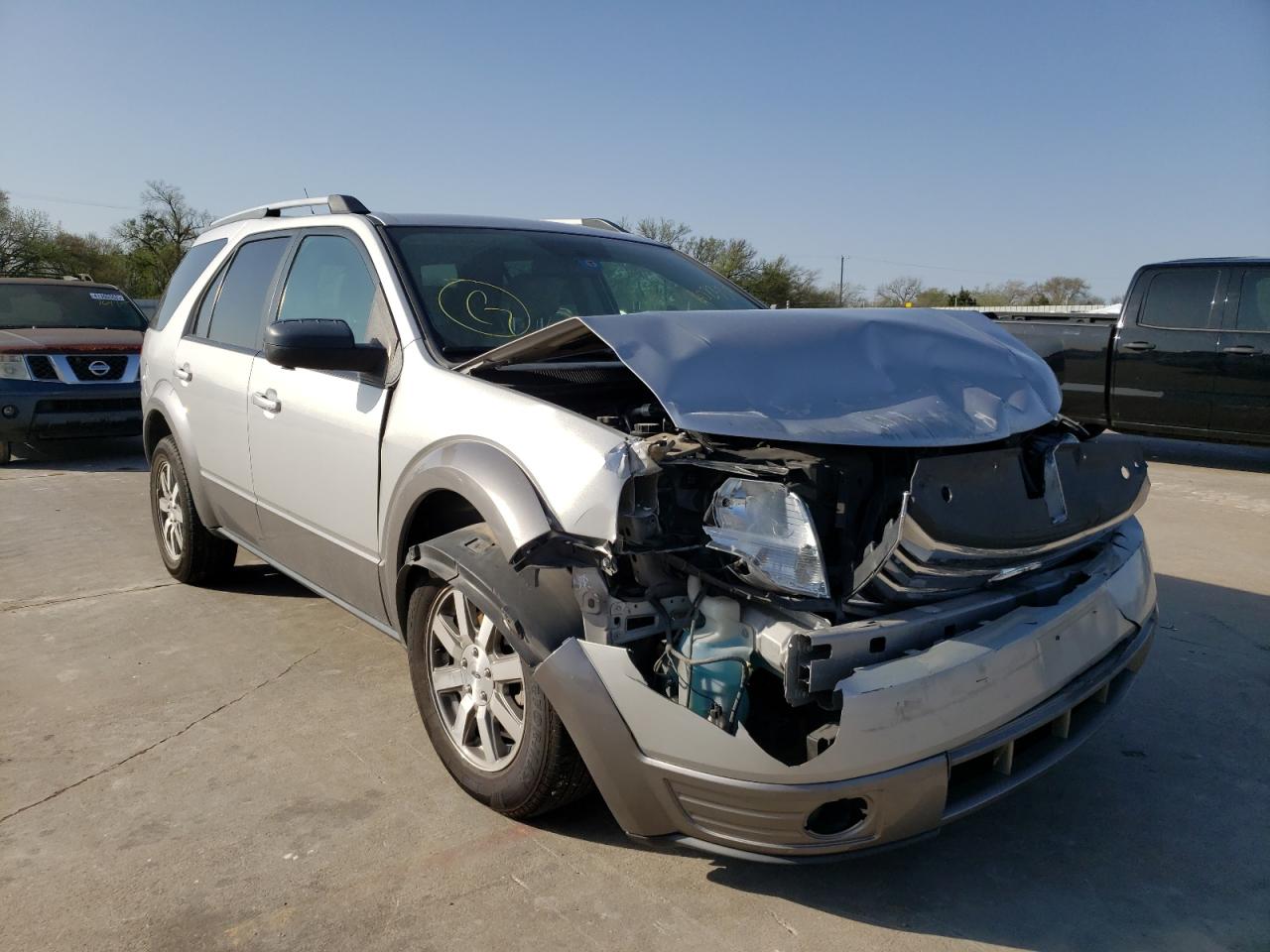 Photo 1 from auction – 2009 FORD TAURUS X S with VIN 1FMDK02W59GA02338