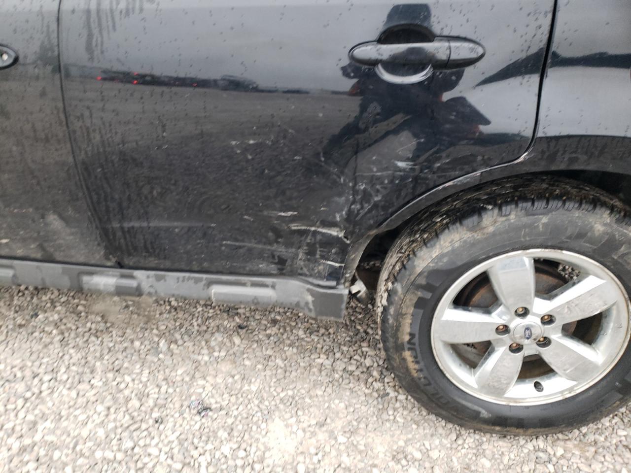 Photo 9 from auction – 2012 FORD ESCAPE LIM with VIN 1FMCU9EG3CKB01291