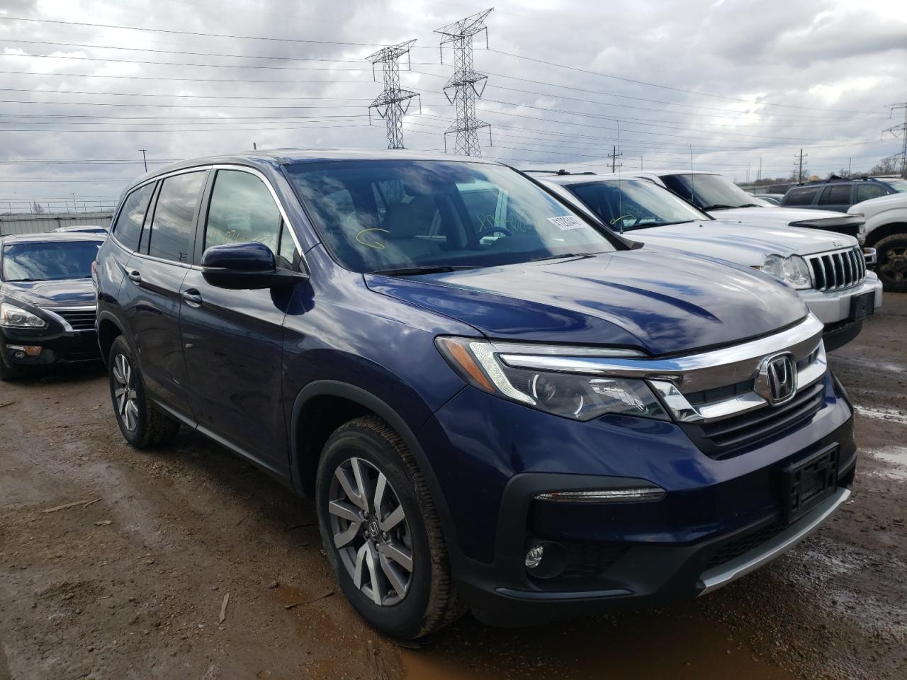 HONDA PILOT EXL 2019 with VIN 5FNYF6H52KB028553 - Photo from auction