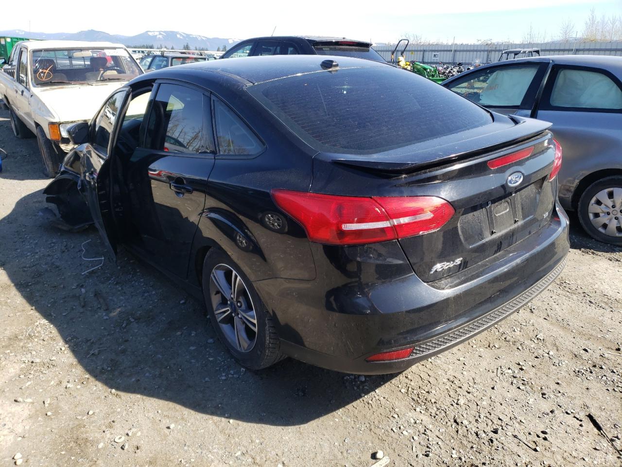 Photo 3 from auction – 2018 FORD FOCUS SE with VIN 1FADP3F25JL224751