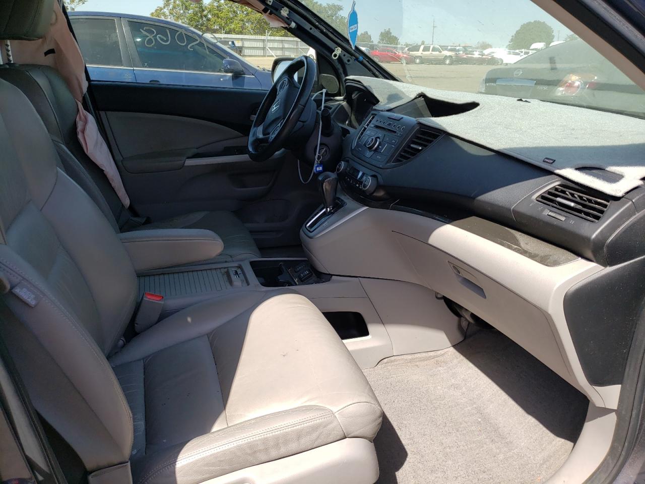 Photo 5 from auction – 2012 HONDA CR-V EXL with VIN JHLRM3H77CC010397