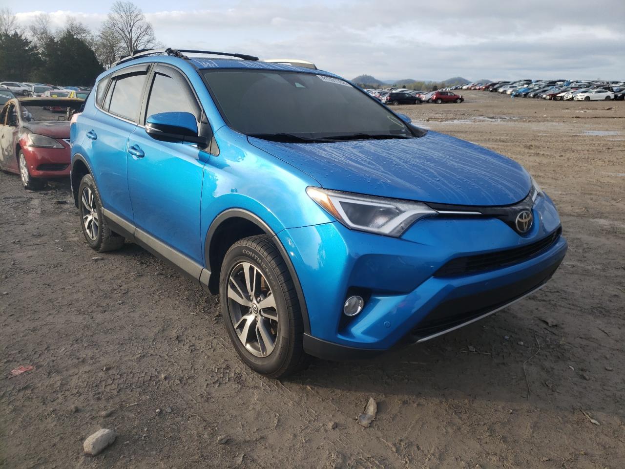 TOYOTA RAV4 XLE 2017 with VIN JTMRFREV5HJ165840 - Photo from auction
