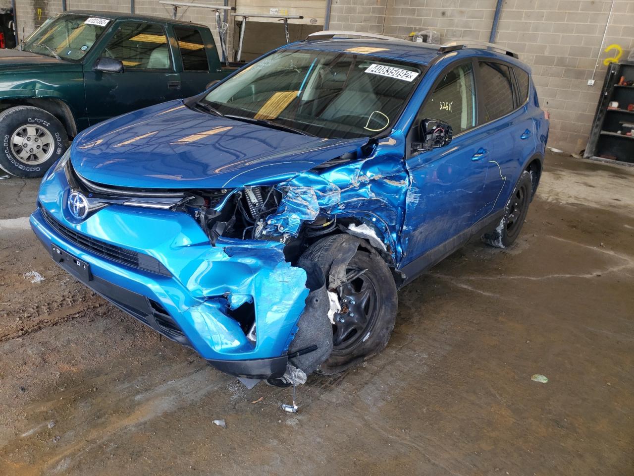 Photo 2 from auction – 2016 TOYOTA RAV4 LE with VIN JTMZFREV6GJ084313