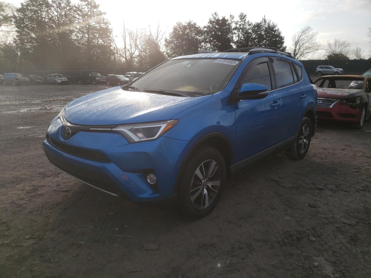 Photo 2 from auction – 2017 TOYOTA RAV4 XLE with VIN JTMRFREV5HJ165840