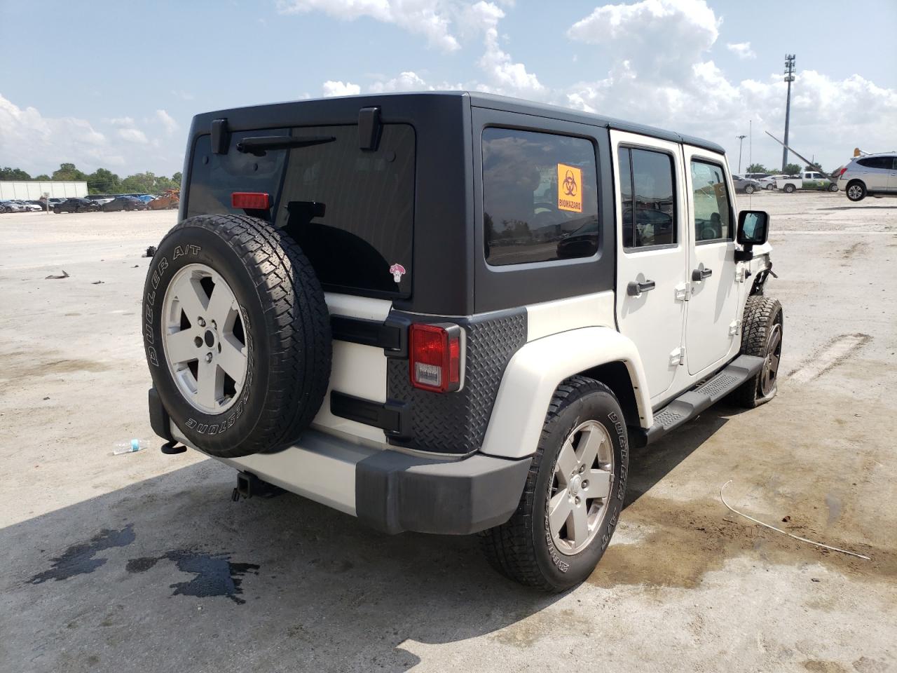 Photo 4 from auction – 2010 JEEP WRA SAHARA with VIN 1J4BB5H10AL187876