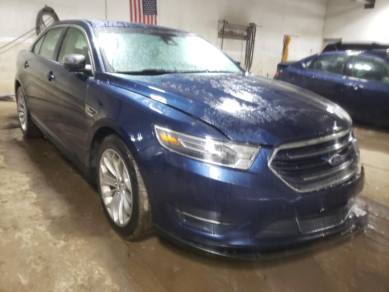 FORD TAURUS LIM 2016 with VIN 1FAHP2J80GG107877 - Photo from auction