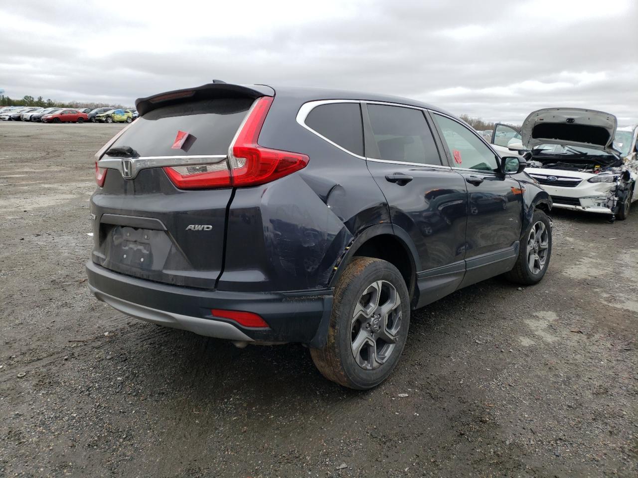Photo 4 from auction – 2017 HONDA CR-V EX with VIN 2HKRW2H57HH664313