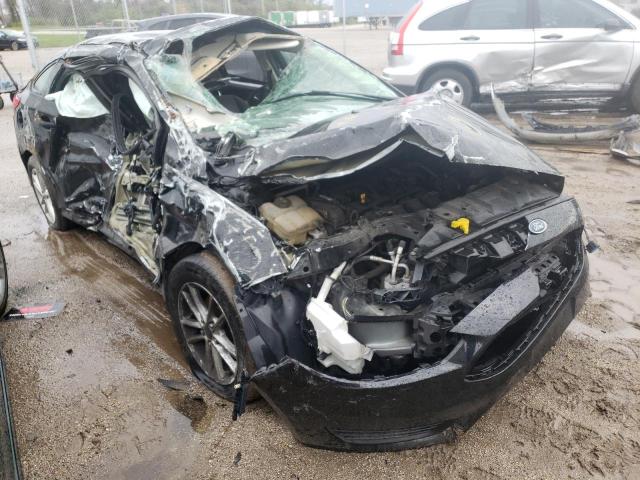 FORD FOCUS SE 2015 with VIN 1FADP3F28FL217512 - Photo from auction
