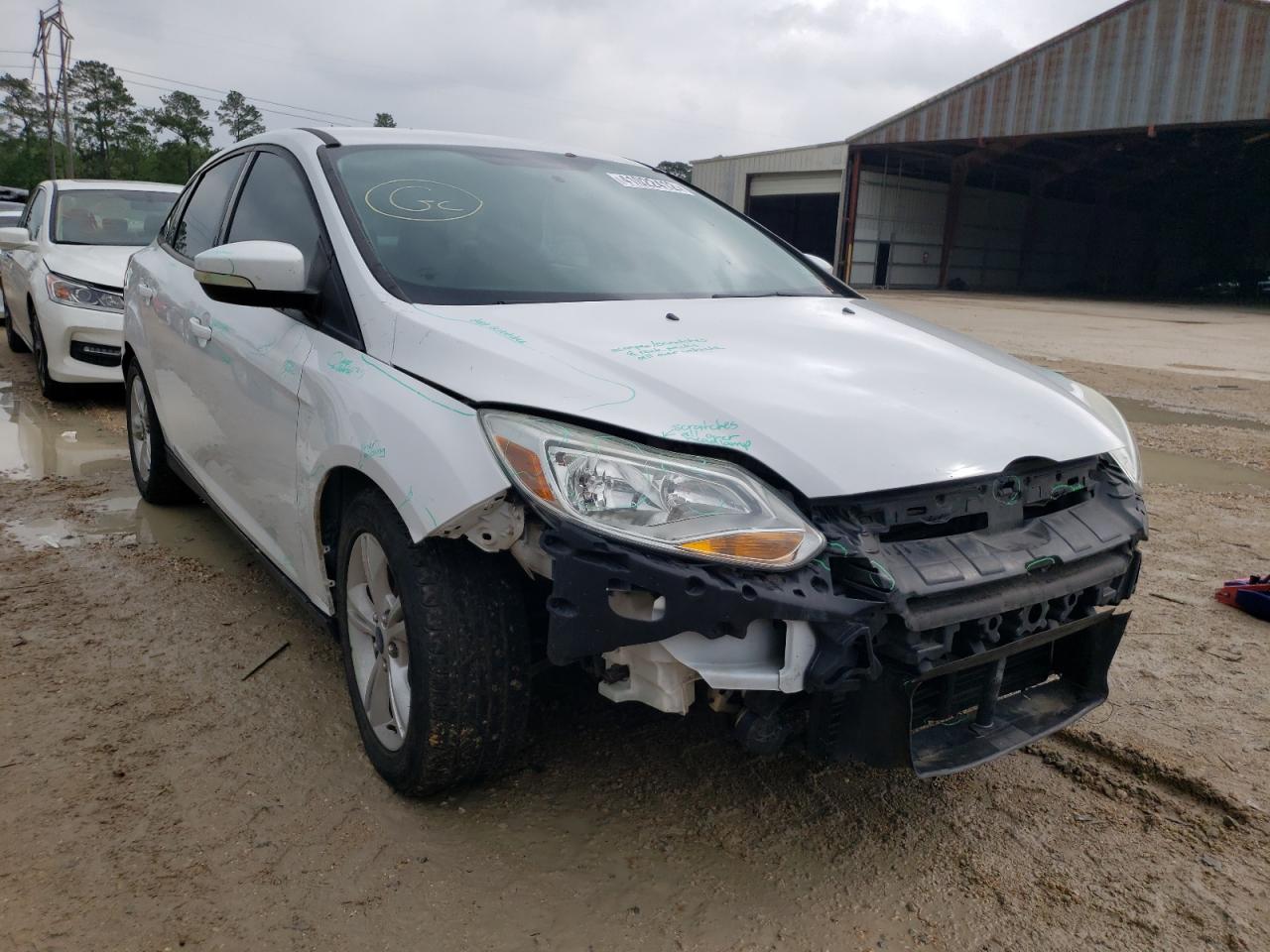 FORD FOCUS SE 2014 with VIN 1FADP3F24EL359872 - Photo from auction