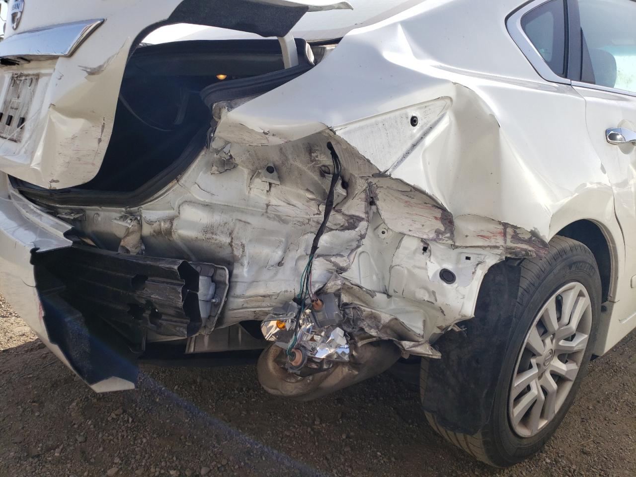 Photo 9 from auction – 2015 NISSAN ALTIMA 2.5 with VIN 1N4AL3AP9FC583139