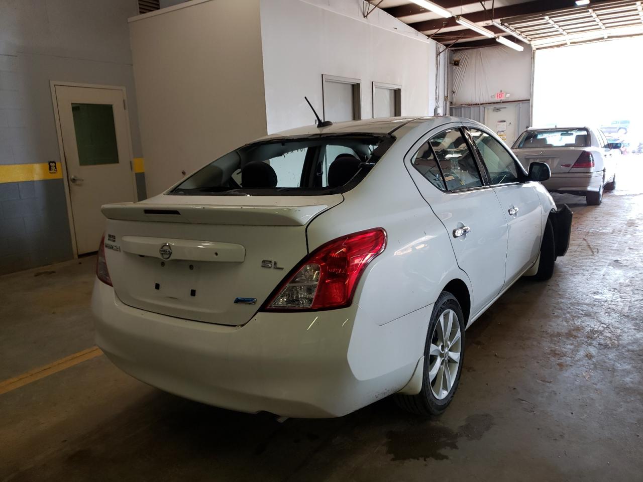 Photo 4 from auction – 2014 NISSAN VERSA S with VIN 3N1CN7AP2EL830432