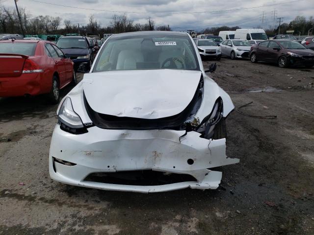 Photo 9 from auction – 2021 TESLA MODEL Y with VIN 5YJYGDEE9MF085292