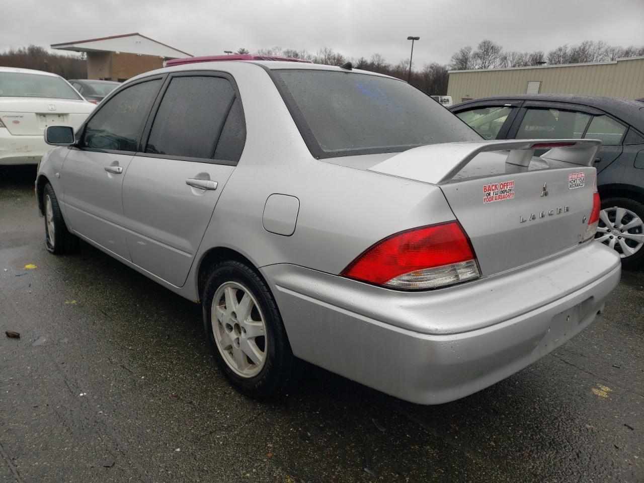 Photo 3 from auction – 2002 MITSUBISHI LANCER LS with VIN JA3AJ36E02U019860