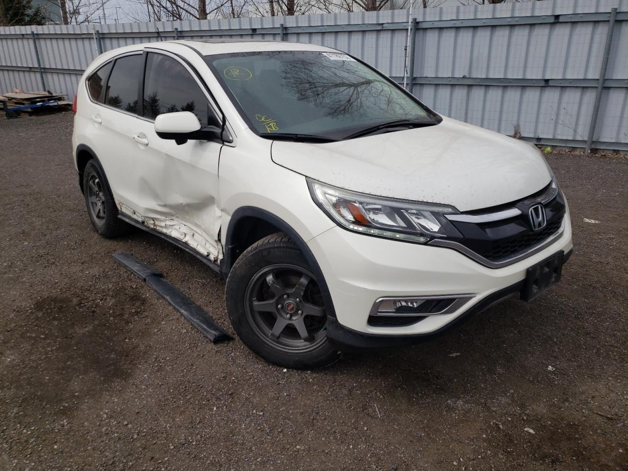 HONDA CR-V EXL 2015 with VIN 2HKRM4H77FH110057 - Photo from auction